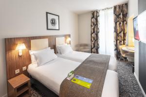 Hotels Holiday Inn Paris Opera - Grands Boulevards, an IHG Hotel : photos des chambres