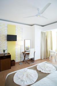 Double Room with Side Sea View (2 Adults + 2 Children)
