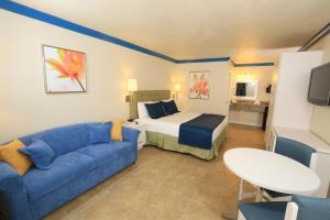King Room with Sofabed and Pool View room in SureStay Plus by Best Western Orlando International Drive