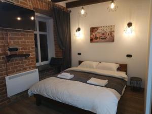 Loft апартаменти з балконом в центрі Львова