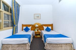 Standard Twin Room room in Zain International Hotel