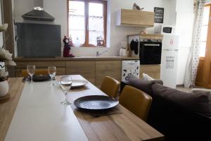 Appartements Chez Emilie & Charles Classe 4 etoiles : photos des chambres