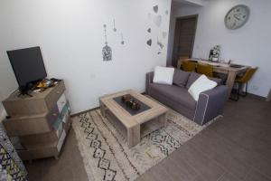 Appartements Chez Emilie & Charles Classe 4 etoiles : photos des chambres