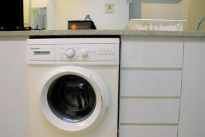 Modern and Full Parquette Studio Springlake Summarecon Bekasi Apartment By Travelio