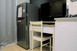 Modern and Full Parquette Studio Springlake Summarecon Bekasi Apartment By Travelio