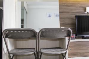 Comfy and Strategic Studio Signature Park Grande Apartment By Travelio