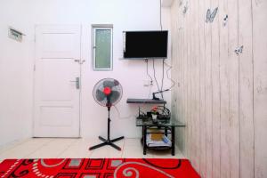 Best Price 1BR Apartment at Teluk Intan By Travelio