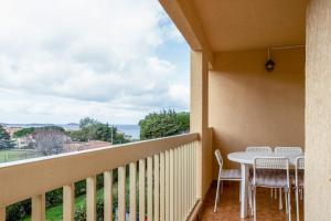 Appartements Apartment With Sea View : photos des chambres