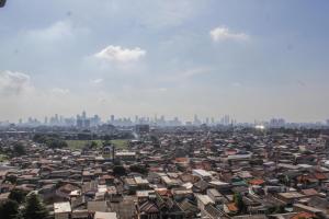 Modern and Relax 2BR @ Bassura City Apartment By Travelio