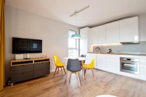 Modern, two bedroom, shipyard view apartment by Grand Apartments