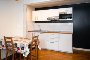 Appartements Le Refuge : photos des chambres