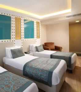 Superior Triple Room with Balcony - Free Access to Spa room in Great Fortune Hotel & Spa