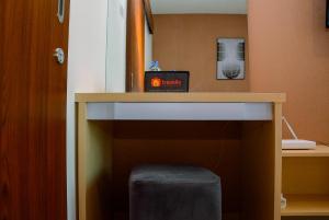 Minimalist and Homey 1BR Grand Kamala Lagoon Apartment By Travelio