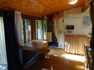 Maisons de vacances Les Gites Accromagnon, Climatisation : photos des chambres