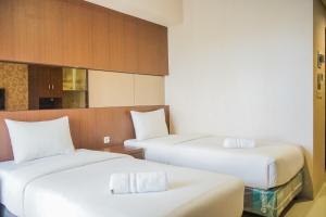 Compact and Cozy Studio Atria Residence Gading Serpong Apartment By Travelio