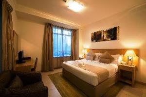 Room #4345513 room in Oaks Liwa Heights Hotel Suites