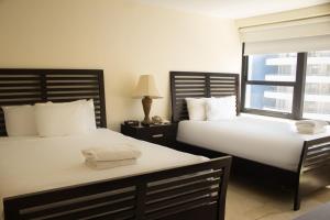 Regular Two-Bedroom 2 Queen + 2 Twin Beds room in Alexander by Design Suites