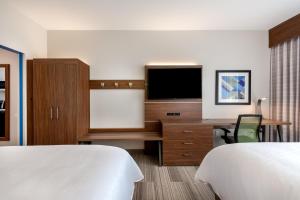 Standard Queen Room with Two Queen Beds and Mobility Accessible Tub room in Holiday Inn Express & Suites Santa Ana - Orange County an IHG Hotel