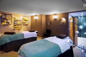 SOWELL HOTELS Le Parc & Spa : photos des chambres