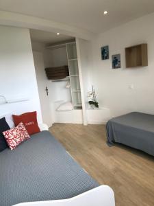 Appartements Duplex 6 pers piscine et vue mer : photos des chambres