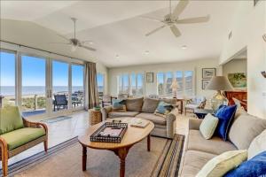 Spacious living area, windows across entire length of home.