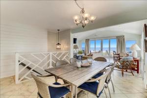 Spacious living area, windows across entire length of home.