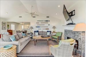 Spacious living area, windows across entire length of home.