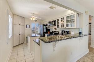 Spacious living area, windows across entire length of home.