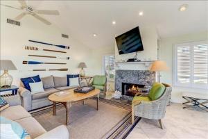 Spacious living area, windows across entire length of home.