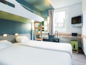 Hotels ibis budget Paris Porte De Montmartre : photos des chambres