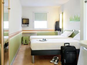 Hotels Hotel Ibis Budget Lyon Eurexpo - : photos des chambres