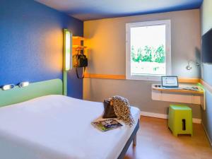 Hotels Ibis Budget Porte de Camargue : photos des chambres