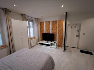 Appartements Studio entre Paris et Versailles : photos des chambres