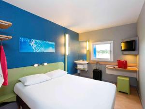 Hotels Ibis Budget Angers Parc des Expositions : photos des chambres