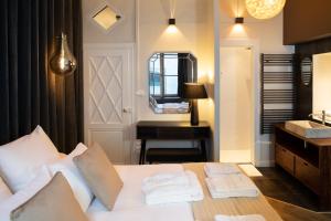 Appartements Ma Suite - Maison Tillot : photos des chambres