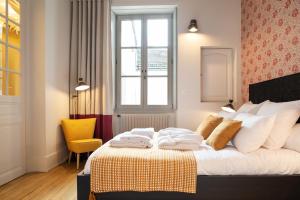 Appartements Ma Suite - Maison Tillot : photos des chambres