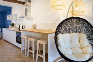 Appartements Ma Suite - Maison Tillot : photos des chambres