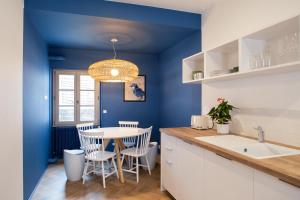 Appartements Ma Suite - Maison Tillot : photos des chambres