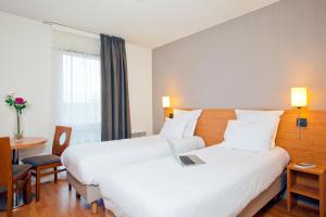 Appart'hotels Sejours & Affaires Nantes La Beaujoire : photos des chambres