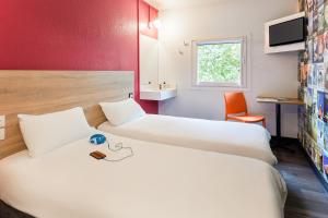 Hotels hotelF1 Les Ulis Courtaboeuf : photos des chambres
