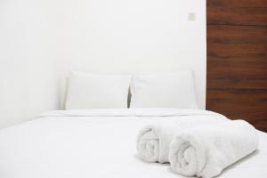 Relaxing 2BR Apartment at Buah Batu Park By Travelio