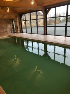 Maisons de vacances MAISON DE VACANCES AVEC PISCINE INTERIEURE - Le Grand Champagne : photos des chambres