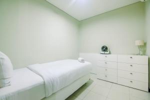 Spacious and Comfy 2BR Nifarro Park Apartment By Travelio