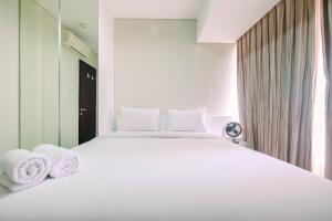 Spacious and Comfy 2BR Nifarro Park Apartment By Travelio