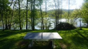 Ferienhaus direkt am See - Kamin, Klima, Sauna und Boot