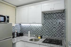 Choose To Be Happy at Valencia - Studio Apartment