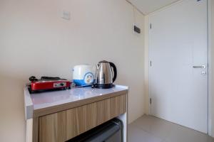 Elegant Studio Apartment at Bogorienze By Travelio