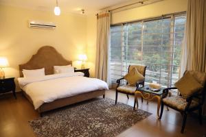 Deluxe Double Room room in Butterfly Guest House Phase 7 Bahria Town