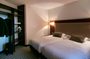 Hotels Kyriad Limoges Centre Gare - Atrium : photos des chambres