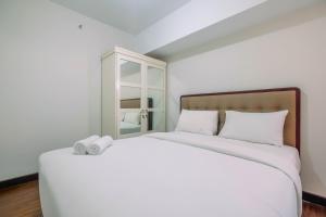 Spacious and Modern 2BR Springlake Summarecon Bekasi Apartment By Travelio